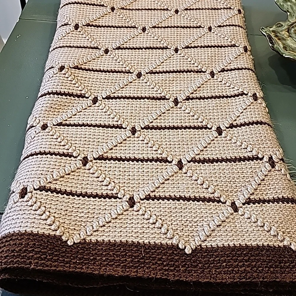 Hand Crocheted afgan. Brown and tan. Beautifully crafted. About 60
